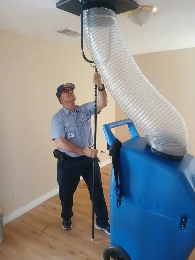 HVAC Installation technician using HEPA equipment in Grapevine